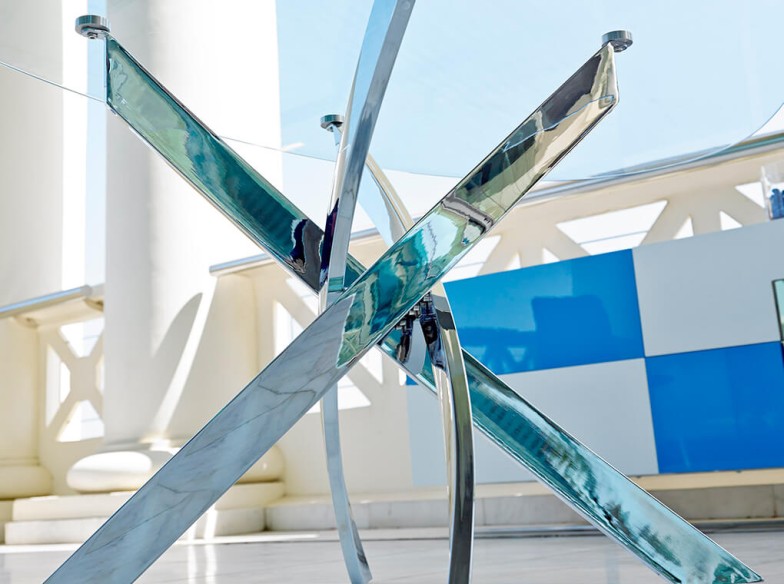 Mesa comedor redonda cristal templado y acero cromado