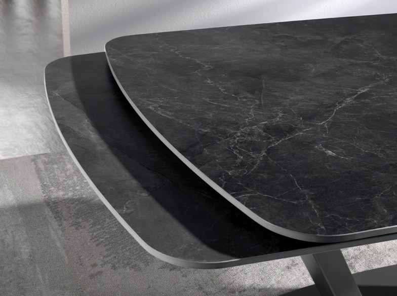Mesa comedor extensible ovalada barril mármol porcelánico y acero negro