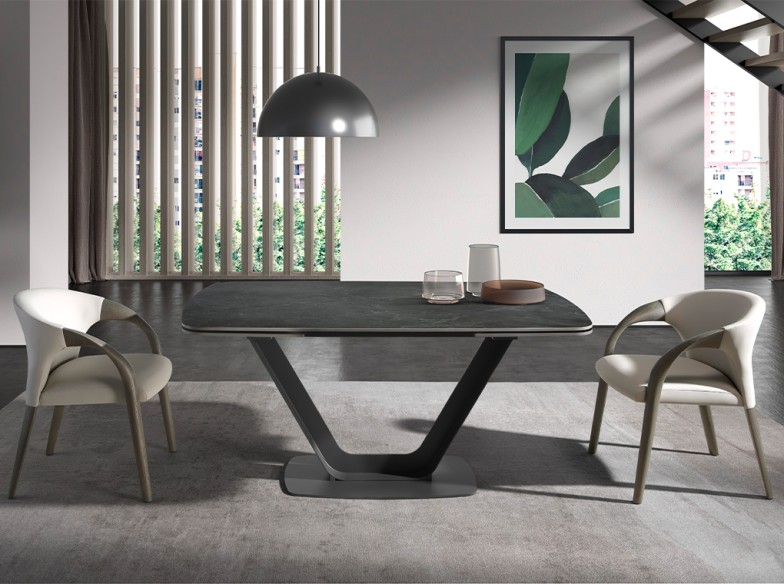 Mesa comedor extensible ovalada barril mármol porcelánico y acero negro